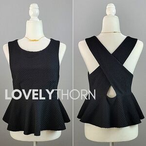H&M TREND // ultra-chic black waffle textured cross back ruffled peplum top
